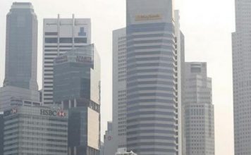 Singapore economy shrinks in warning for global trade – Malay Mail