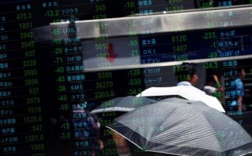 Asian shares turn lower on Sino-U.S. trade, recession worries – Reuters