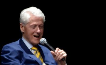 Did Jeffrey Epstein Have a Painting of Bill Clinton Wearing a Dress in His Flat? – Snopes.com